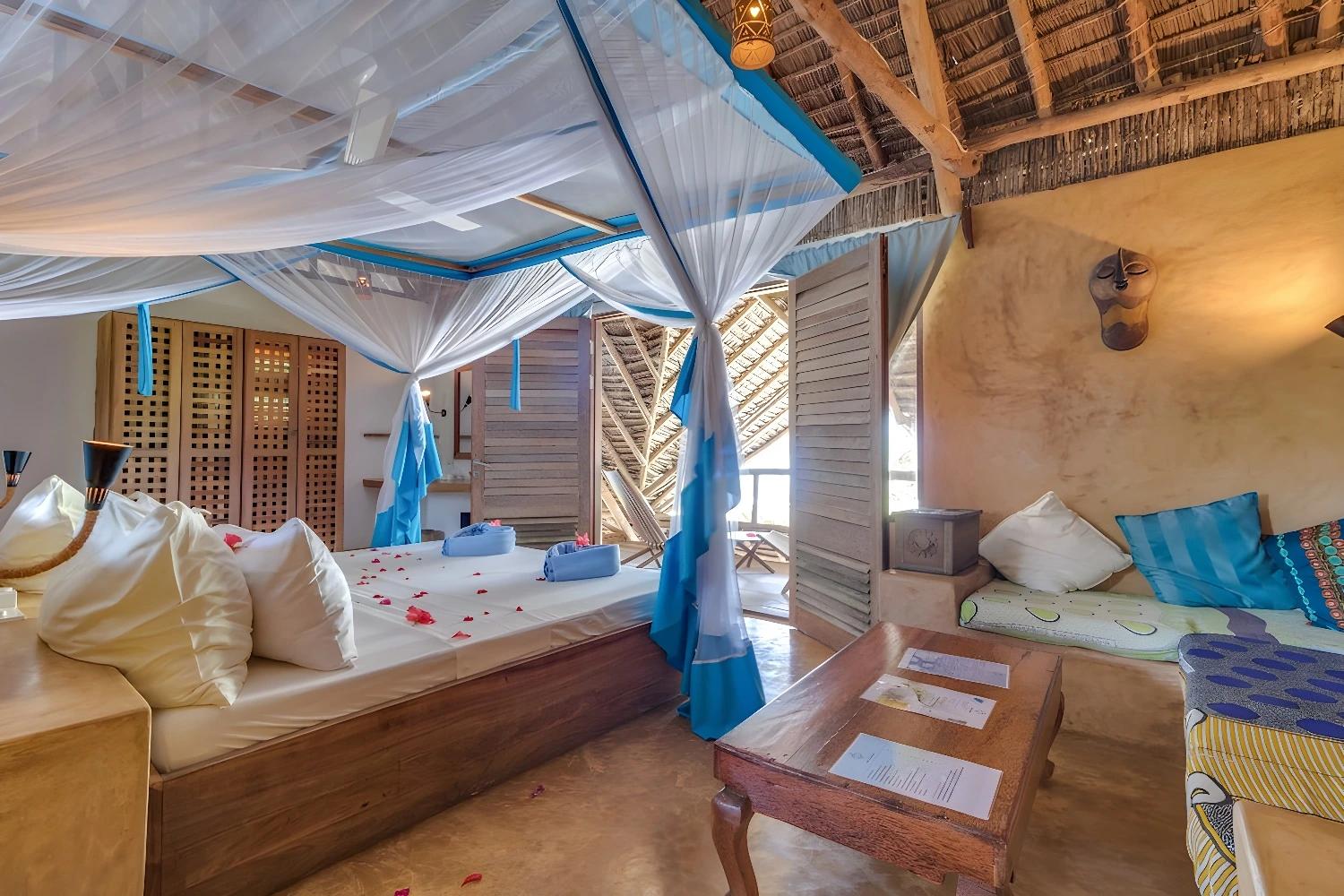 Chambre avec lit à baldaquin au SeVi Boutique Hotel Zanzibar