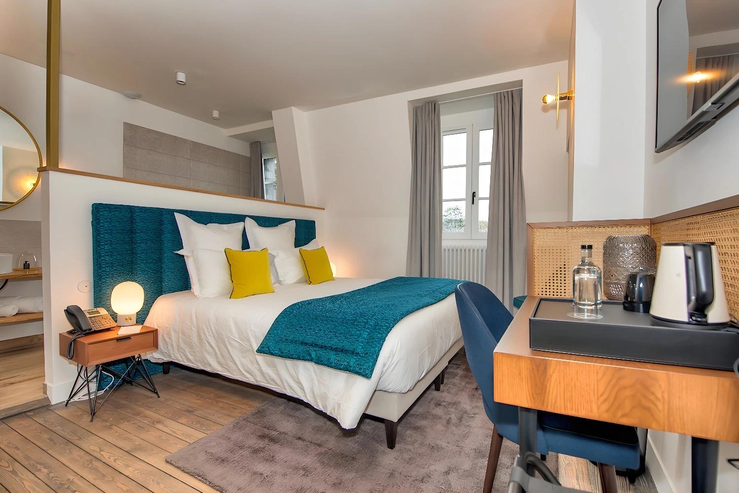 Chambre moderne et confortable aux Jardins de Coppelia