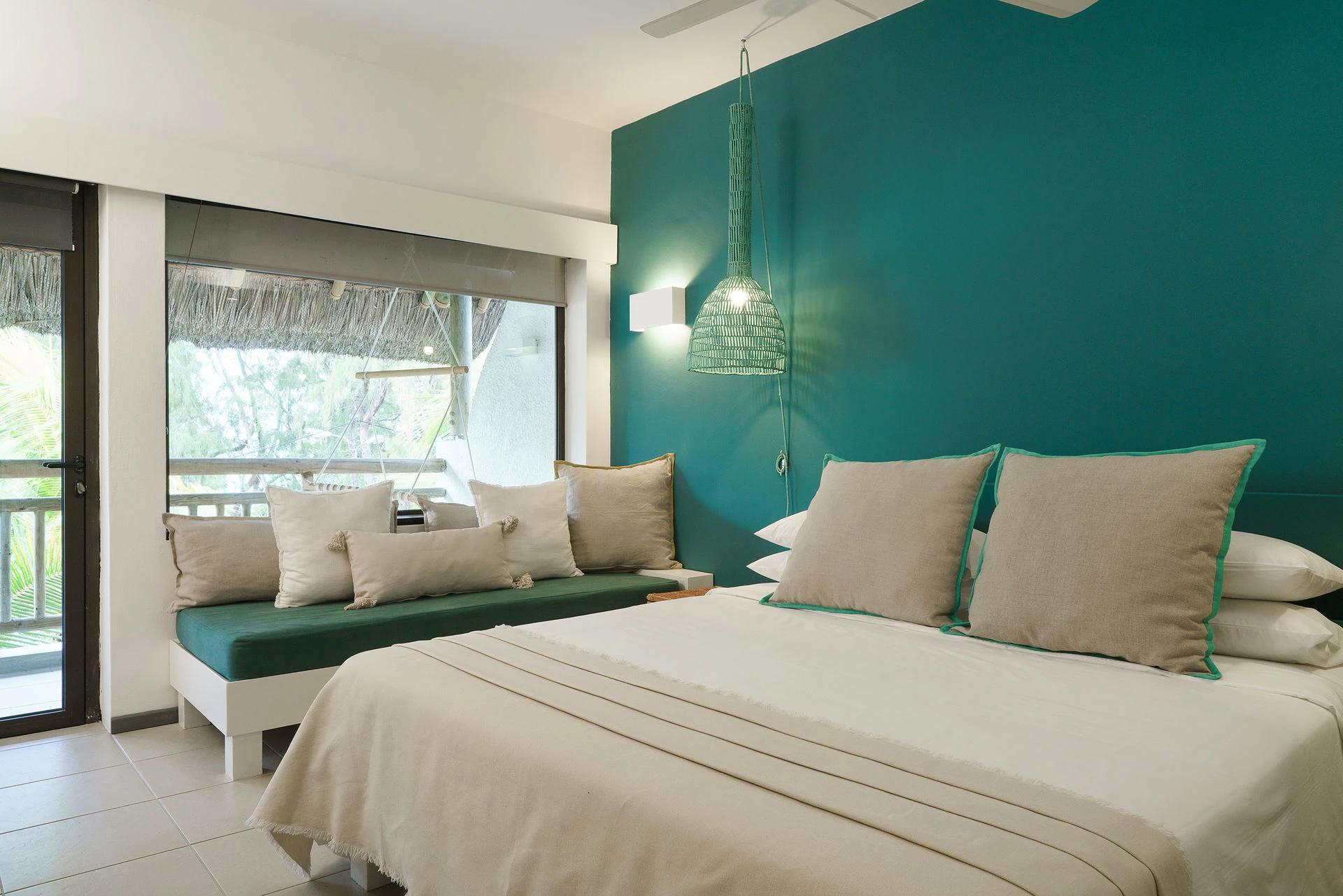 Chambre moderne avec décoration élégante à Coin de Mire Attitude