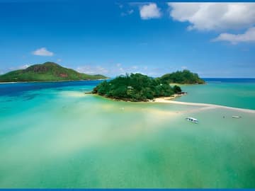 Île privée aux Seychelles : luxe et nature préservée